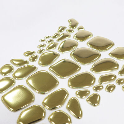 Fabrika Özel Metallik Altın TPU Isı Transfer Etiketi - Lüks Giysi ve Moda Giysileri için Düzensiz Şekil Emblemi