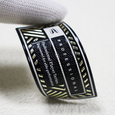 Özel TPU Yüksek Frekanslı Yama - Spor kıyafetleri için Metallik Altın ve Siyah Profesyonel Oyuncu Serisi Rozeti